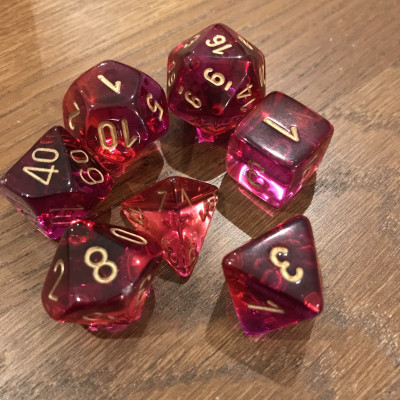 Chessex - Gemini - Rouge Translucide - Violet - Set 7 dés - CHX 26467