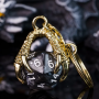 Porte clef dragon avec D20 noir