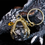 Porte clef dragon avec D20 noir